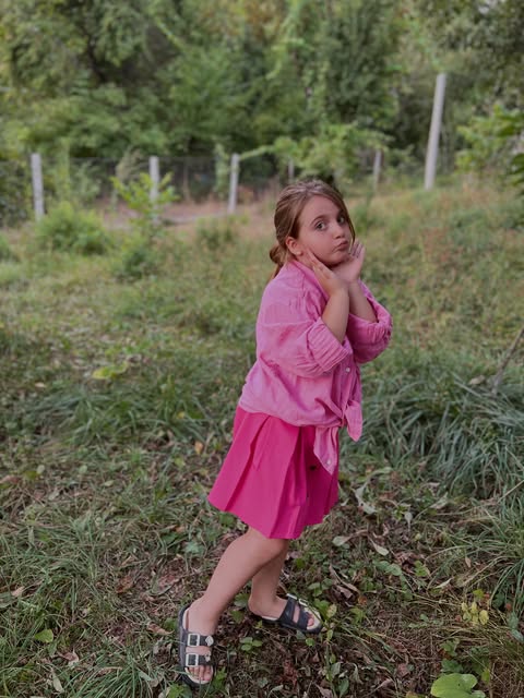 Eva wearing pink outdoors
